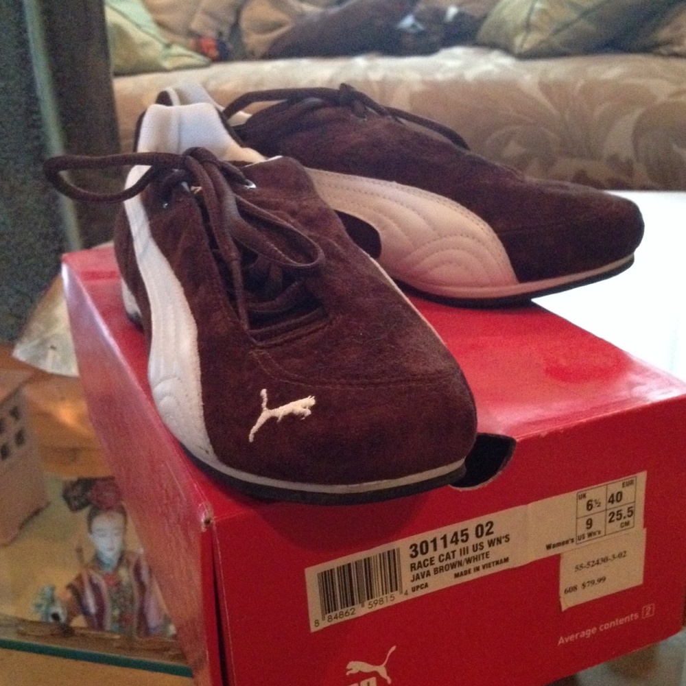 Size 9 Pumas Brown